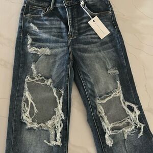 Risen distressed jeans. New with tags